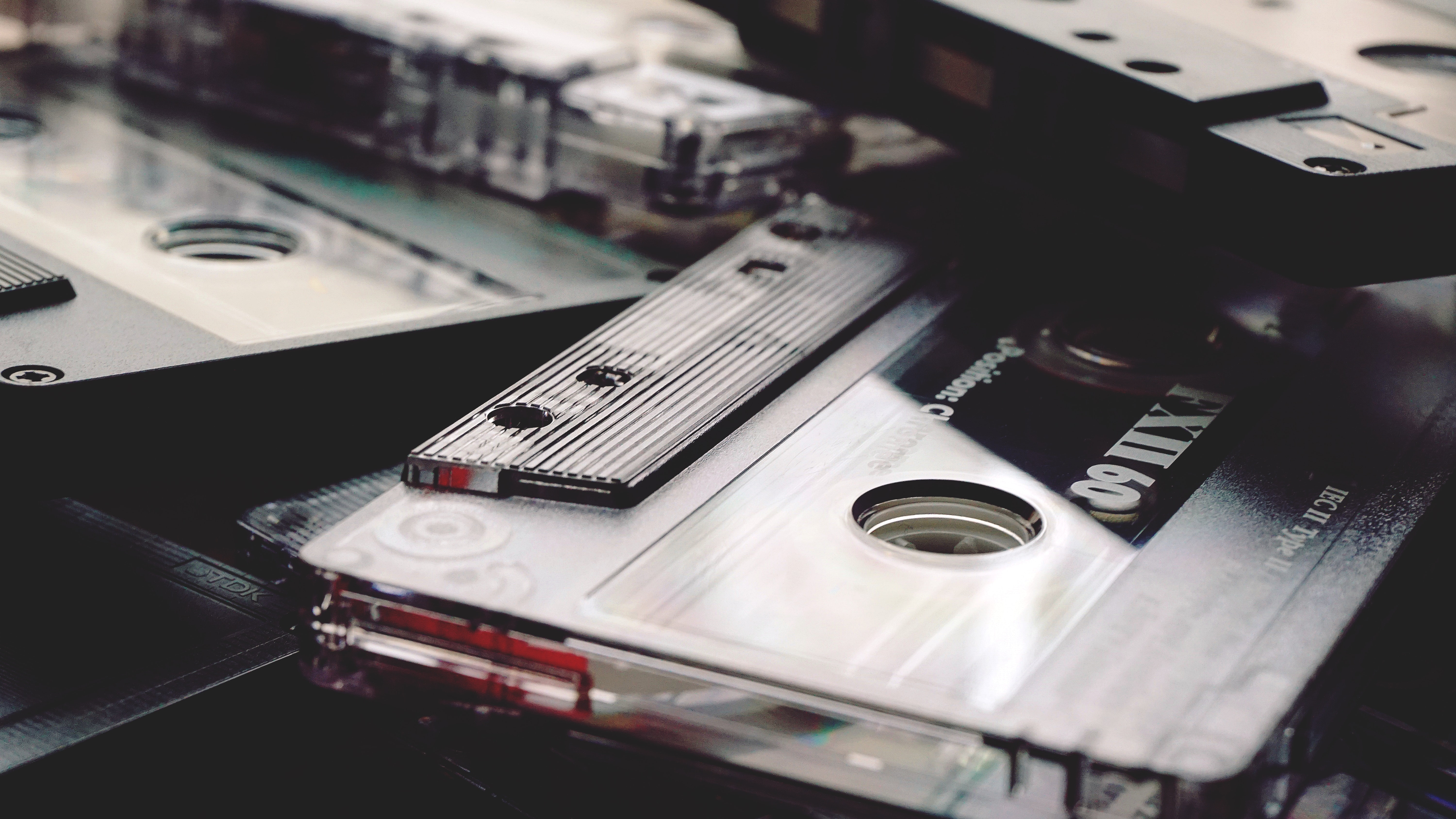 A collection of audio cassette tapes.
